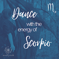 Woman holding a large scarf out in front of herself in the woods and text that says "Dance with the energy of Scorpio"